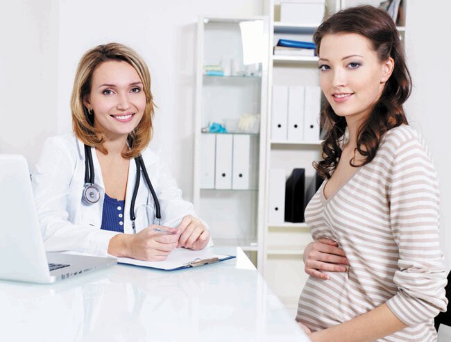 прием беременной у врача